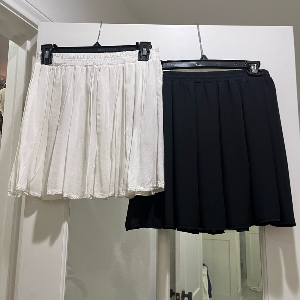 Two brandy Melville skirts white and black